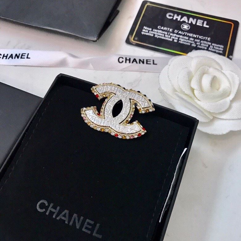 Ch**el brooches